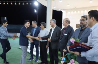 تکریم مجاهدان سنگر اقتصاد کشور در منطقه ویژه اقتصادی لامرد
